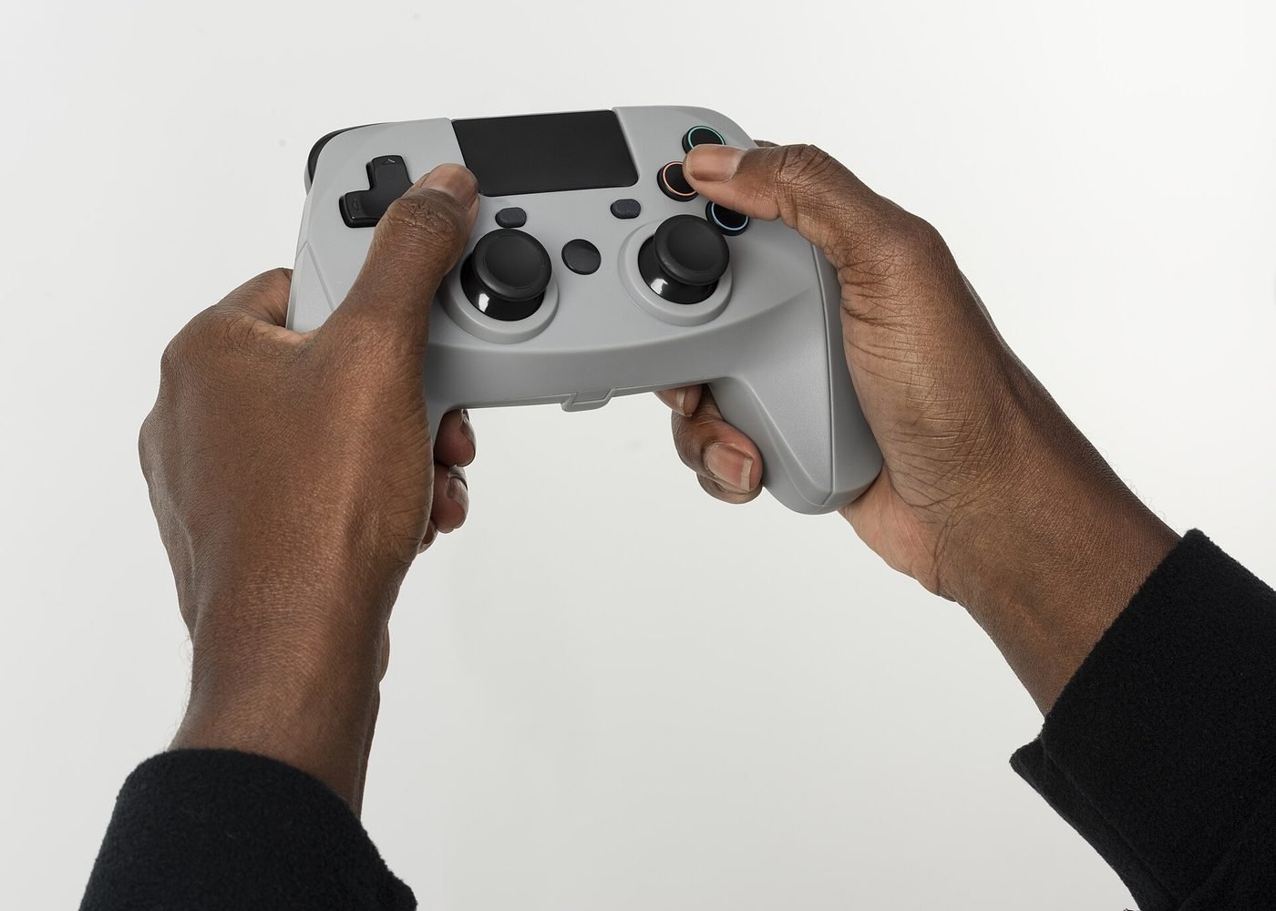 Hands holding a video game controller — illustrative photograph.