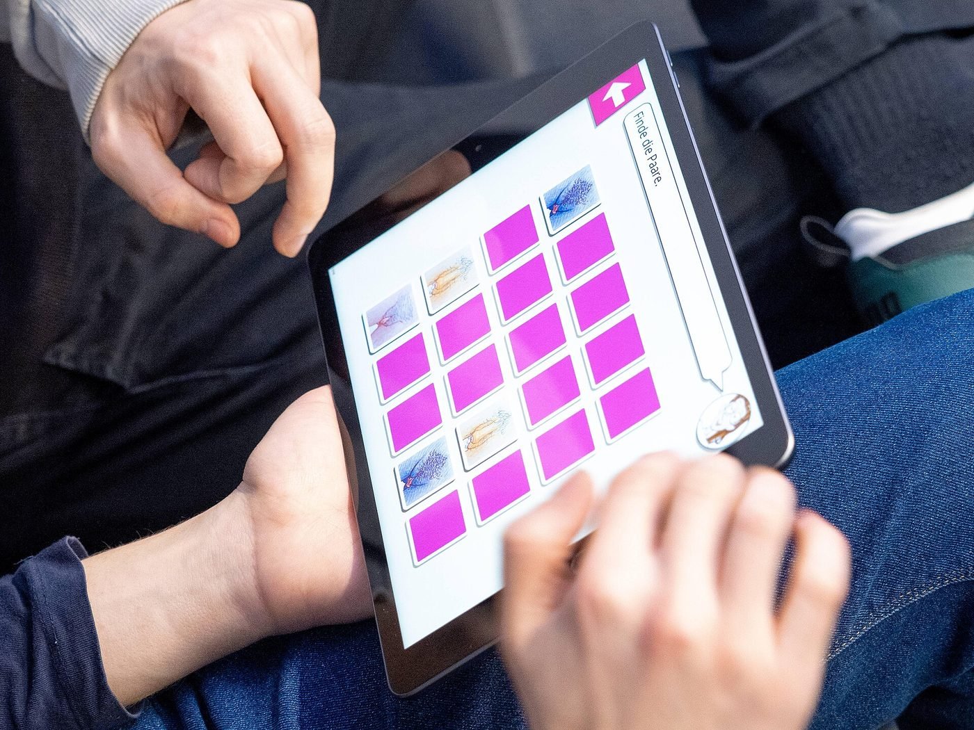 A mobile game being played in an inclusive game-lab session — illustrative photograph.